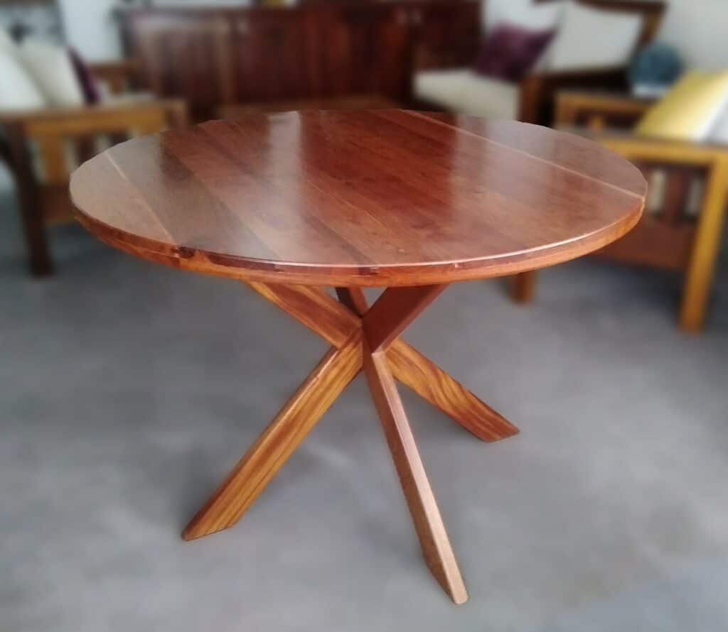 Bespoke round table with 4 crossed legs